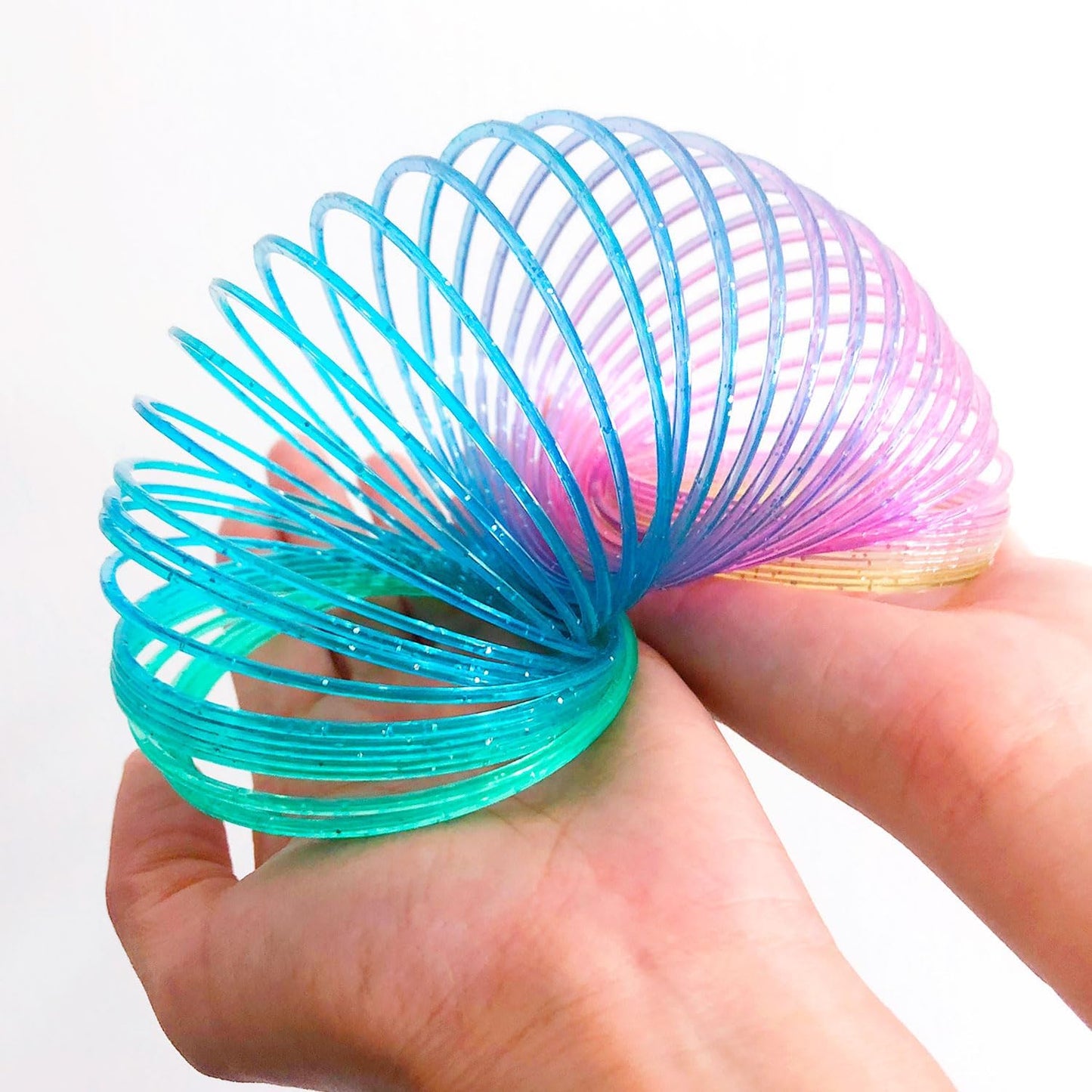 12 Pcs Slinky Toys for Kids Goodie Bag Stuffer Rainbow Slinky Party Favors Spring Toy Slinkies for Carnival Prize Classroom Exchange Gifts (2.5 inches)